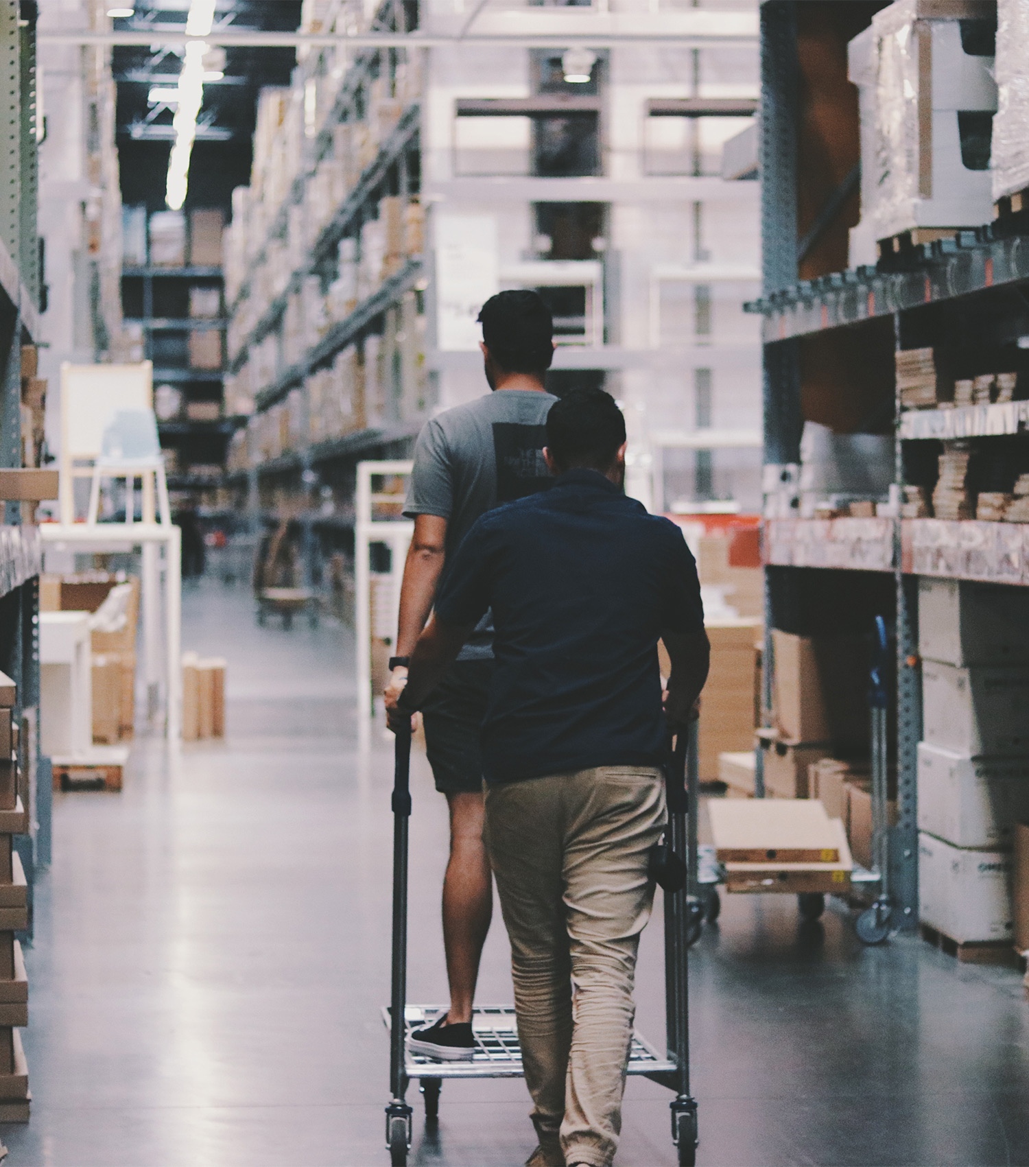 men-going-around-a-warehouse-1797428